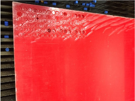 Figure 7: Red acrylic pins cutted by the laser cutting machine